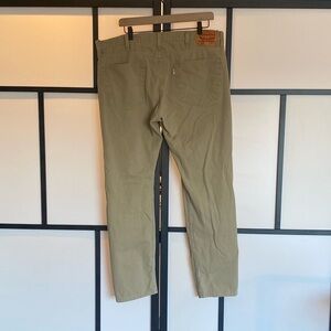 Levi's 502 tan pants. Size 36. HEMMED